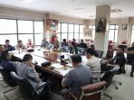 rapat 1